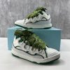 The Curb is a ’90s-inspired sneaker with an assertive design and exaggerated volumes. Made from nappa calfskin, suede and mesh, this elaborately assembled model features ultimate comfort thanks to its round shape, padded tongue and metallic eyelets. Curb leather sneakers Almond toe Waxed and woven double laces with a herringbone motif Quilted tongue with the Lanvin label and an embossed Mother and Child logo