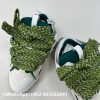 The Curb is a ’90s-inspired sneaker with an assertive design and exaggerated volumes. Made from nappa calfskin, suede and mesh, this elaborately assembled model features ultimate comfort thanks to its round shape, padded tongue and metallic eyelets. Curb leather sneakers Almond toe Waxed and woven double laces with a herringbone motif Quilted tongue with the Lanvin label and an embossed Mother and Child logo